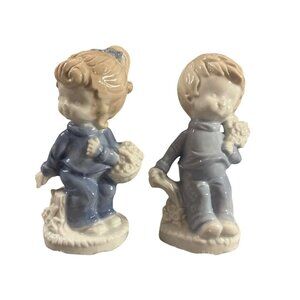 Vintage Boy & Girl Blue Ceramic Figurines Pair With Blossoms & Trunks Nursery